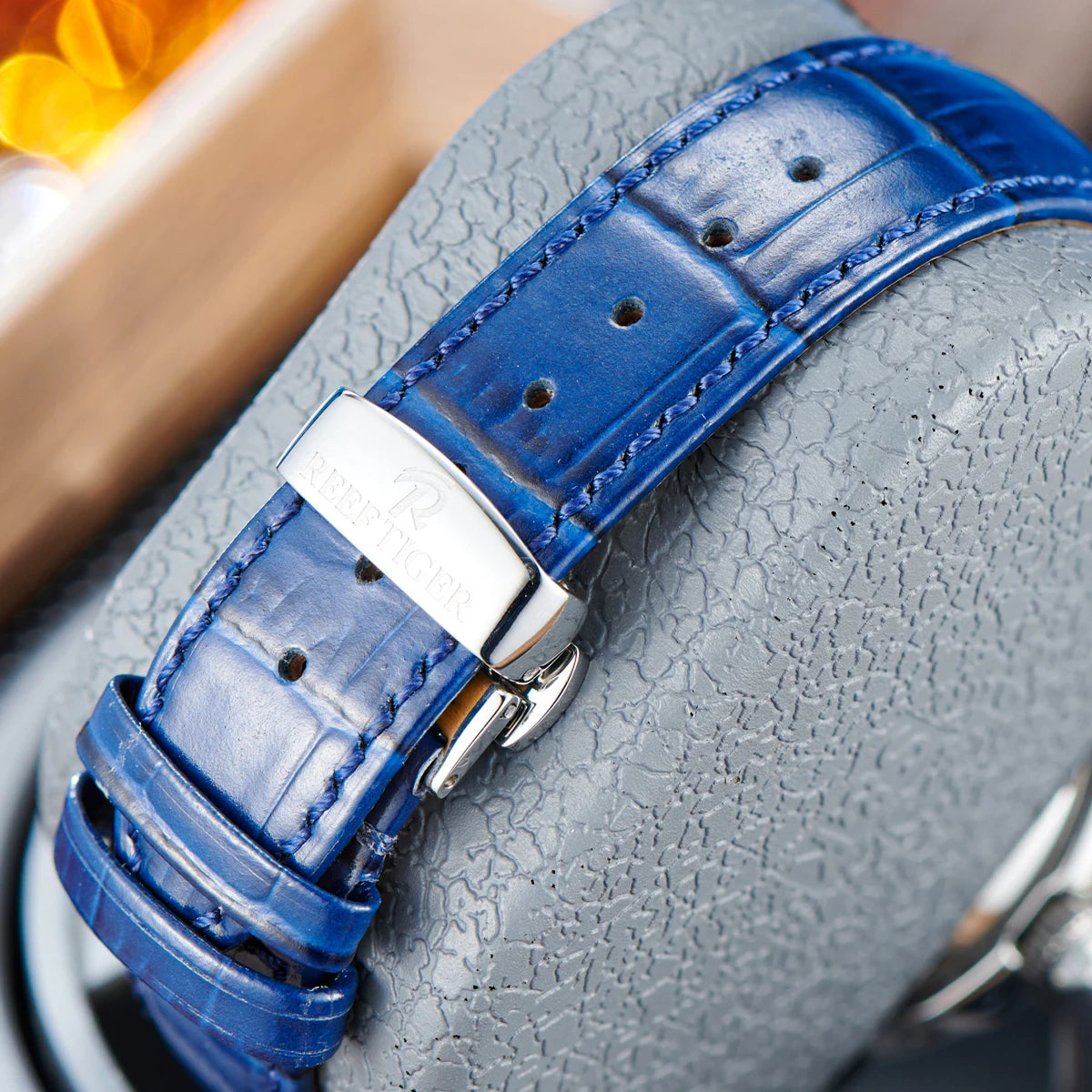 Automatic moonphase watch by reef tiger diamonds bezel blue dial