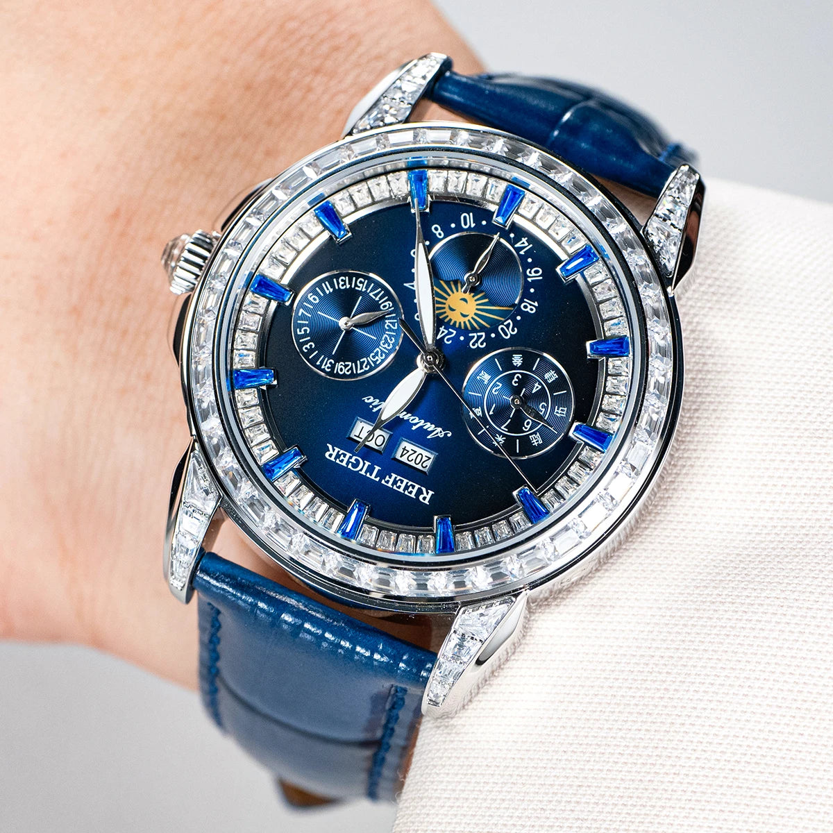 Automatic moonphase watch by reef tiger diamonds bezel blue dial