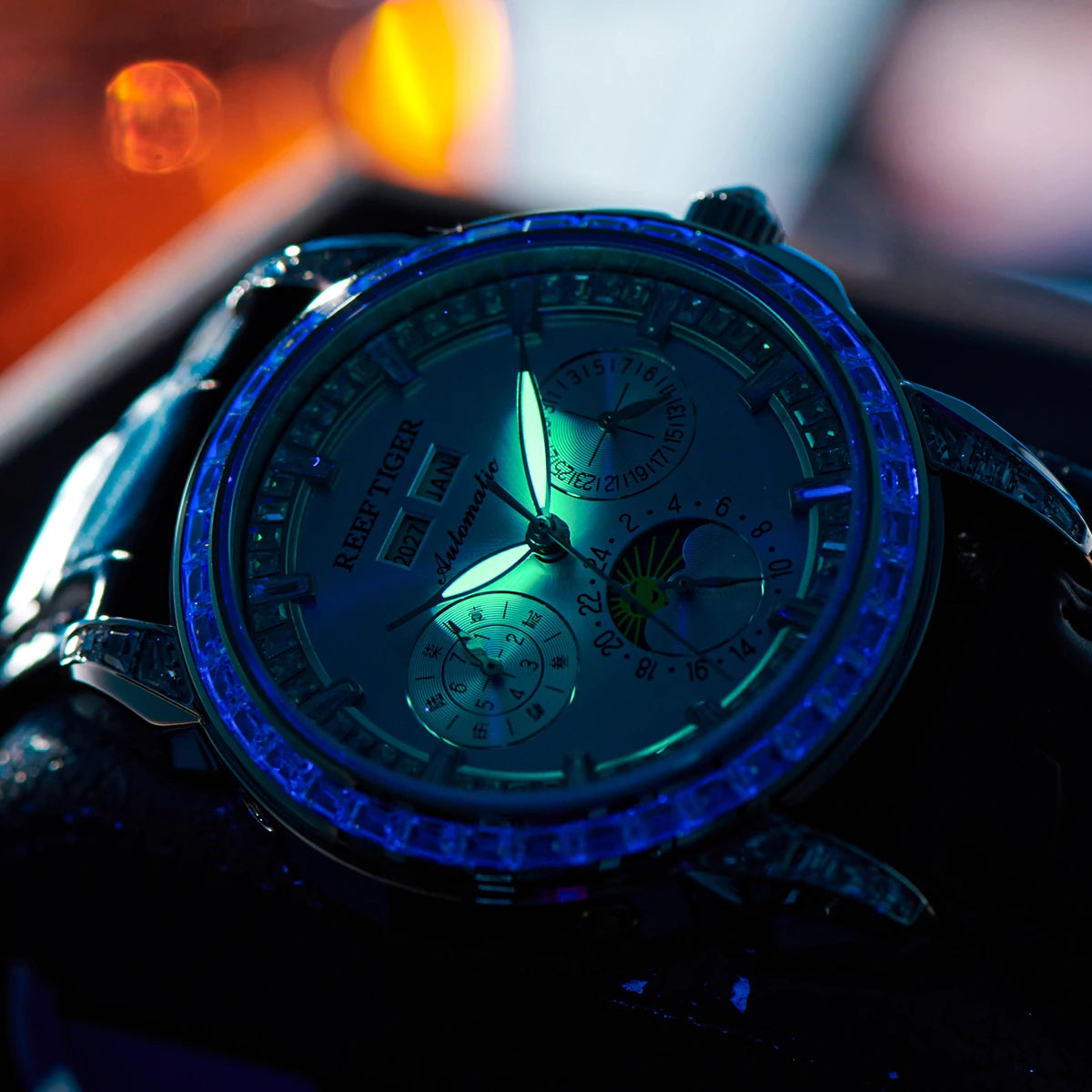 Automatic moonphase watch by reef tiger diamonds bezel blue dial