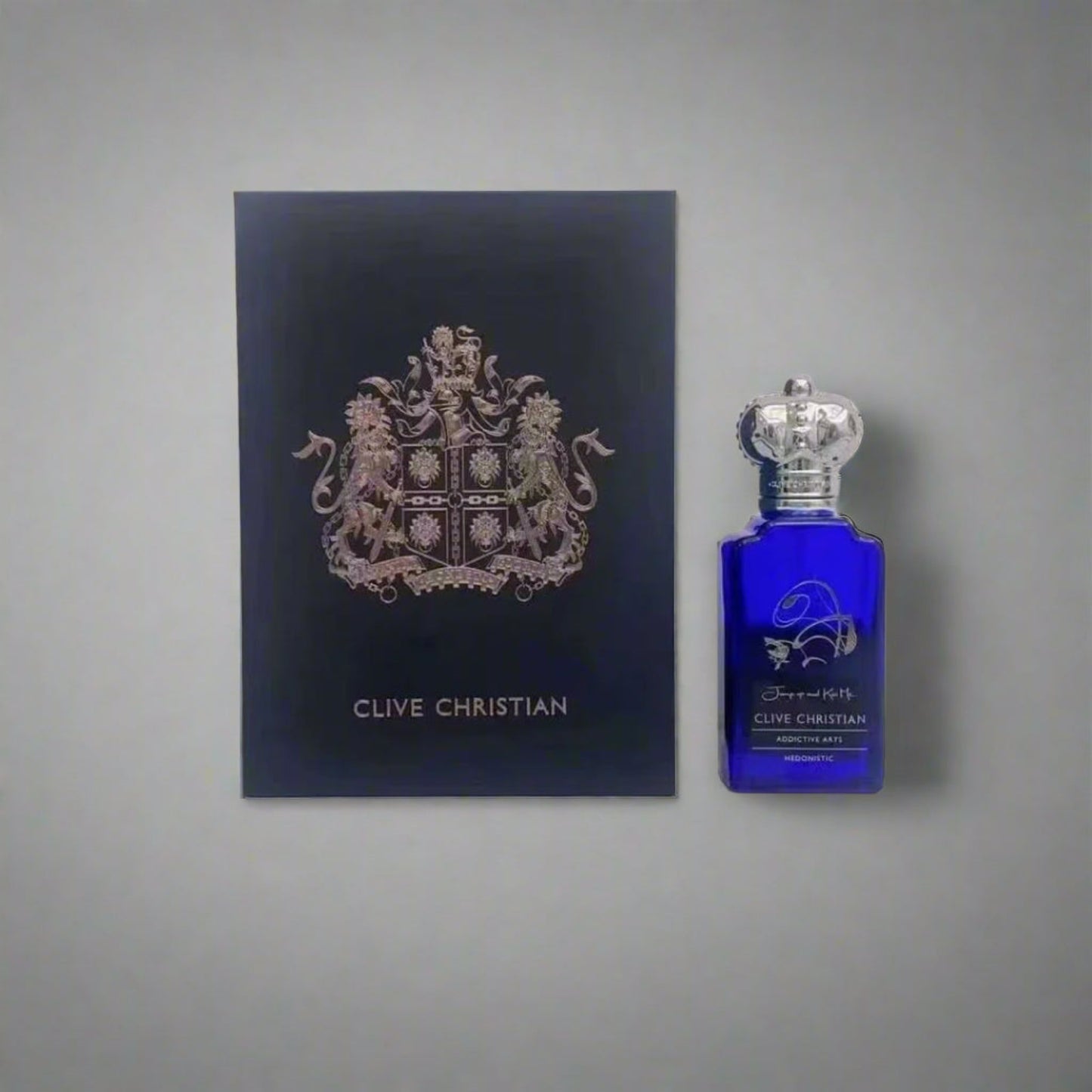 Clive Christian perfume bottle and packaging on a light background