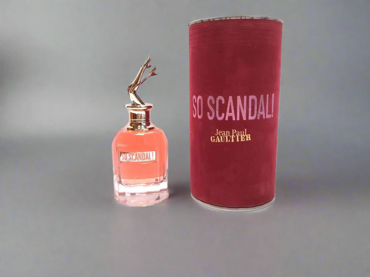 Jean Paul Gaultier perfume bottle and packaging on a white background