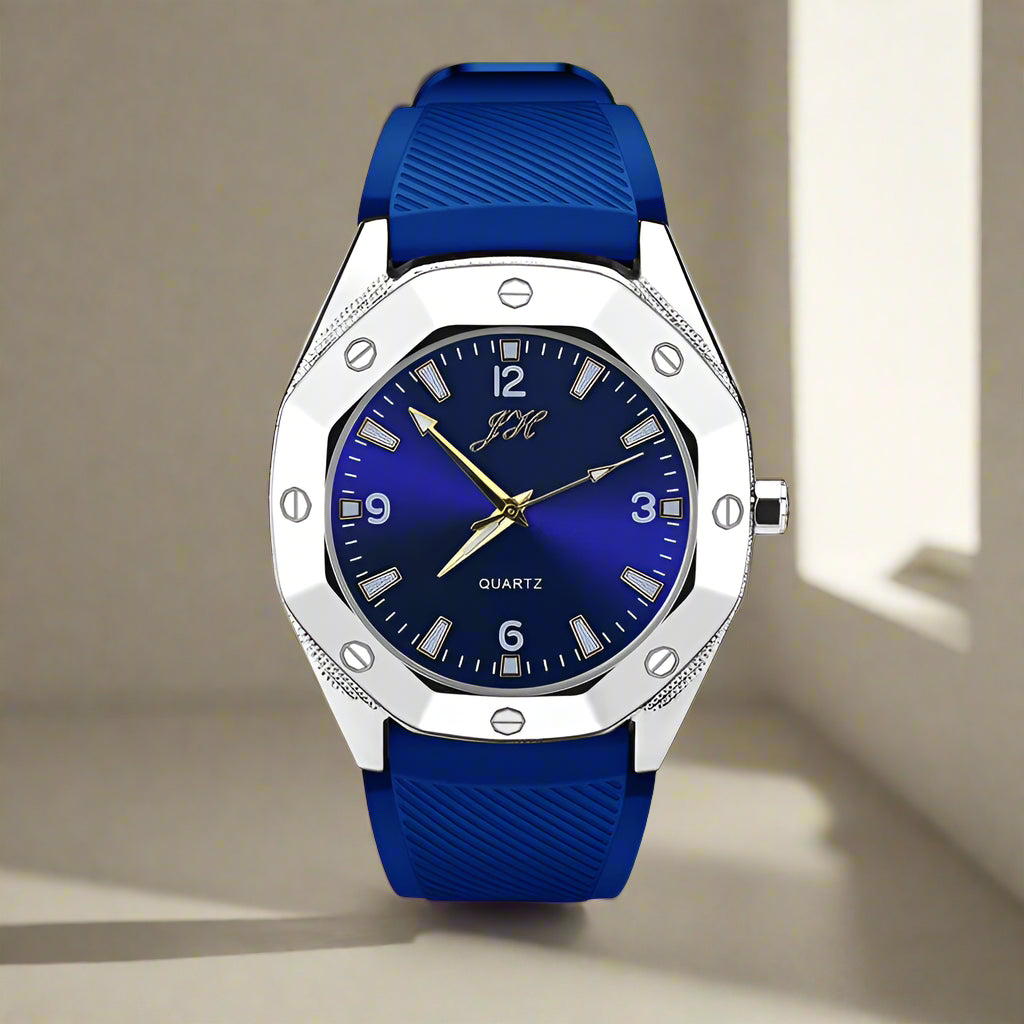 Blue watch with silver case on a white background