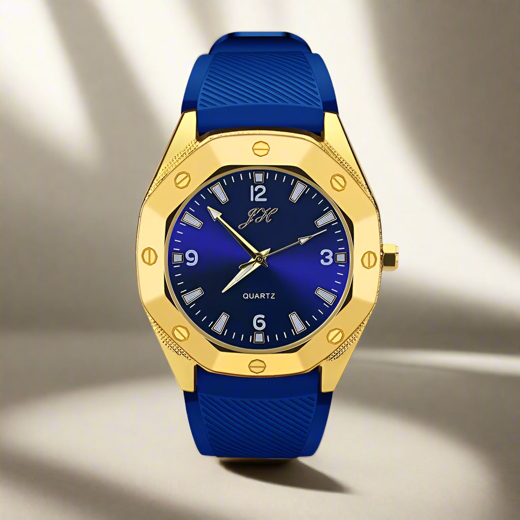 Gold-framed watch with blue strap and face on a white background