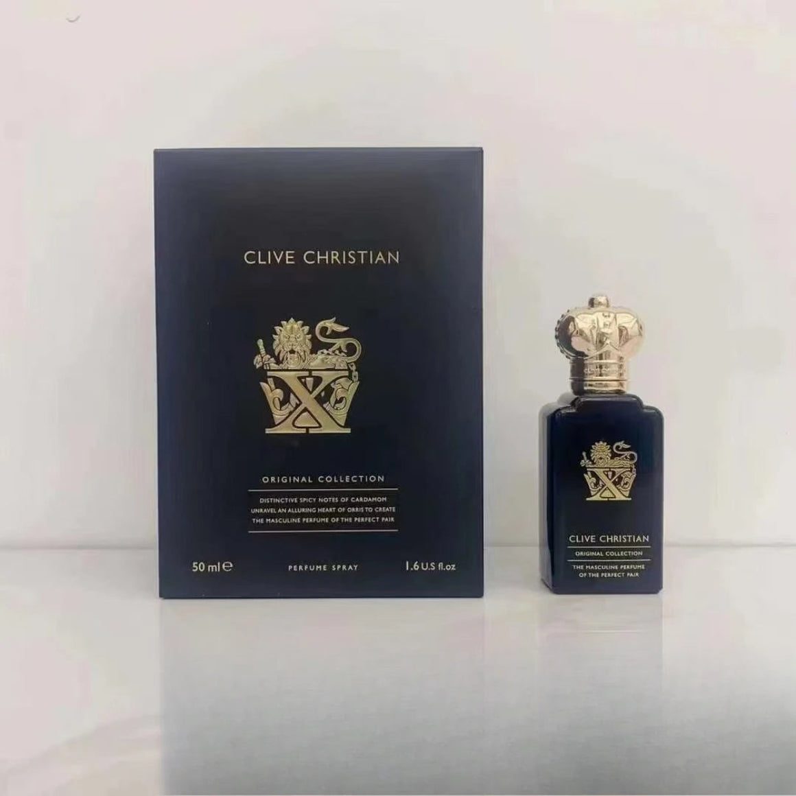 Clive Christian perfume bottle and packaging on a white background