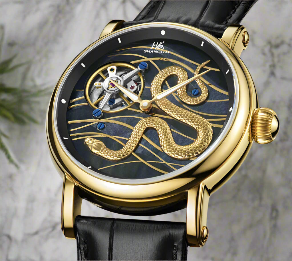 Luxury watch with gold snake design on a black background