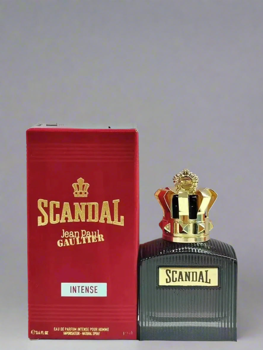 Scandal perfume bottle and packaging on a gray background
