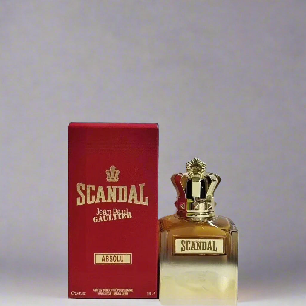 Scandal perfume bottle and packaging on a light gray background
