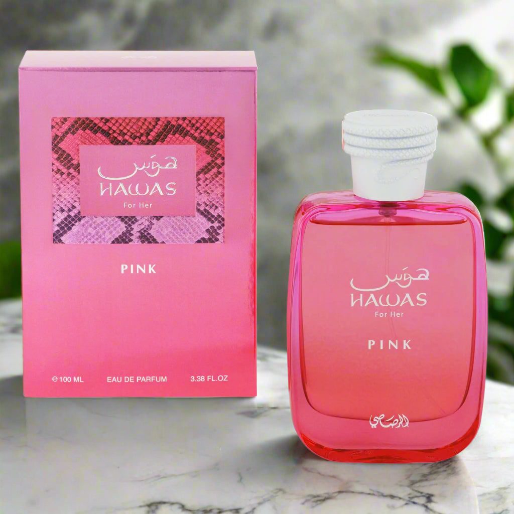 Pink HAWAS perfume bottle and packaging on a white background