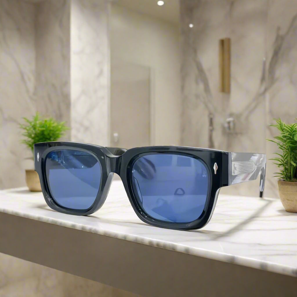 Sunglasses with blue lenses on a white background