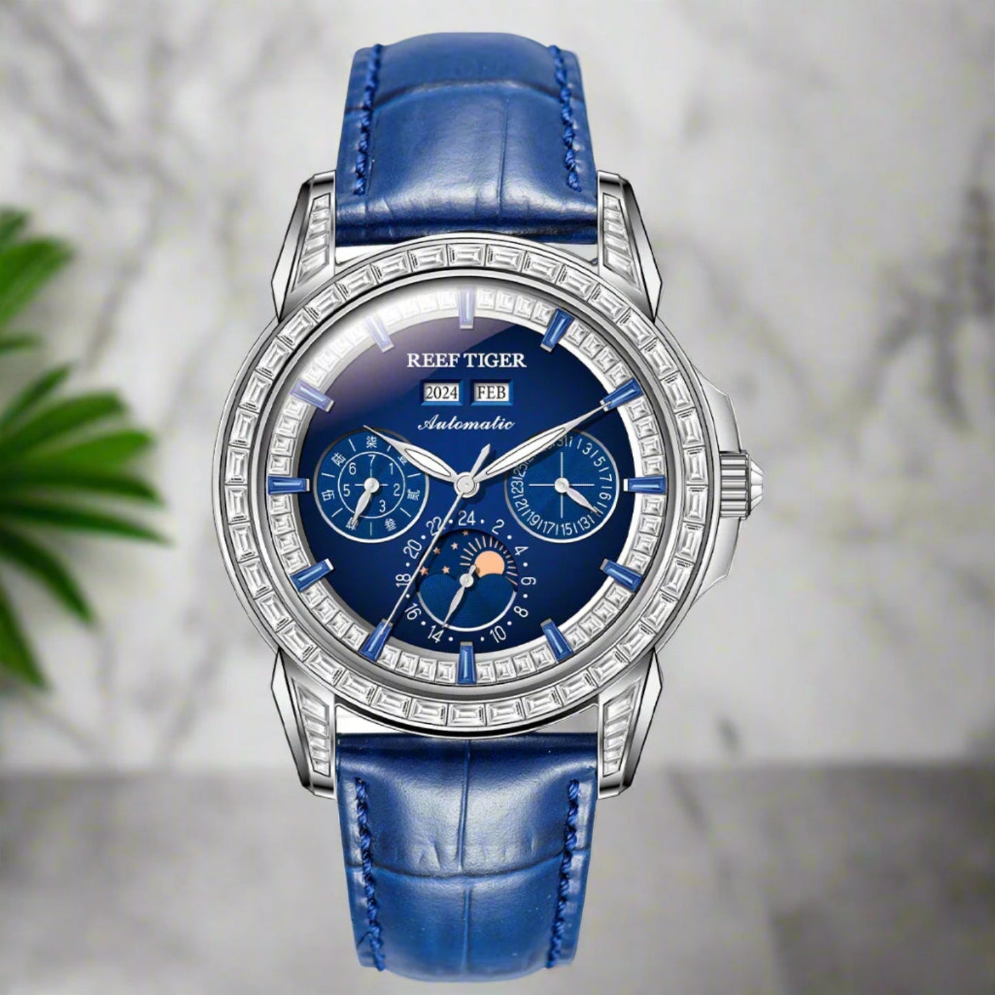 automatic moonphase watch by reef tiger diamonds bezel, blue dial,b