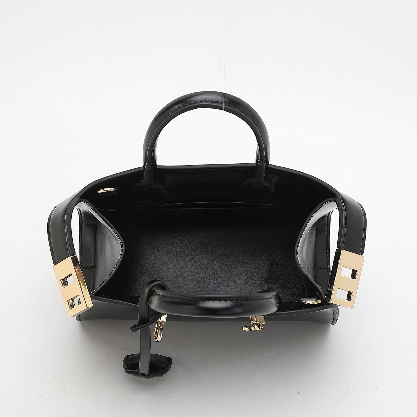 Ari modern classic shell bag – soft structured style double lock charm